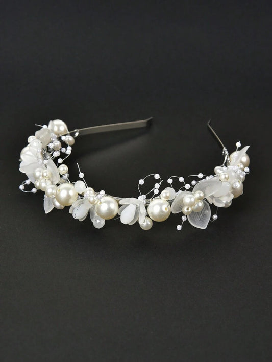 Pearl and leaf headband on a black background