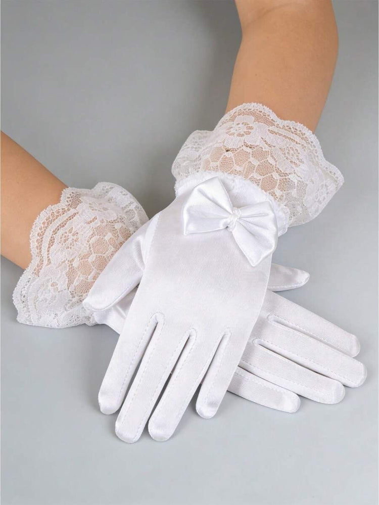White gloves with lace cuffs and a bow on a gray background