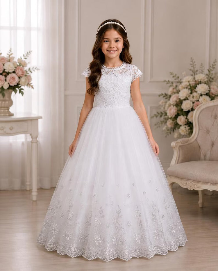 Child wearing a white communion dress