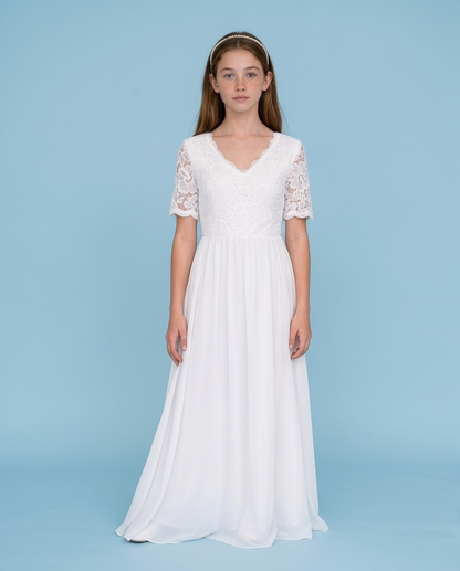 Girl wearing a short sleeve chiffon white dress