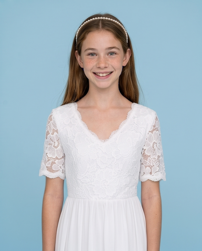 Girl wearing a short sleeve chiffon white dress
