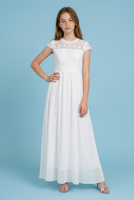Girl in a chiffon communion dress in a blue background