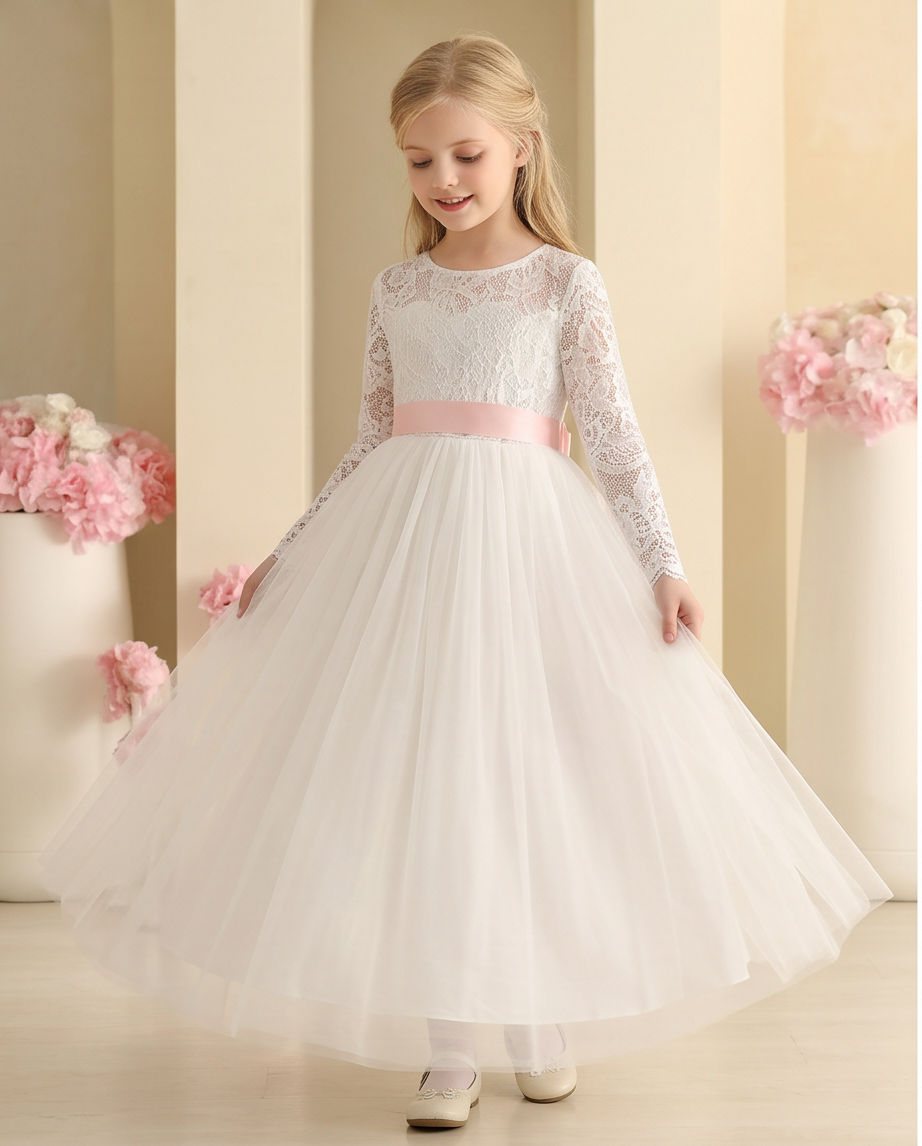 Girl twirling in ivory tulle dress