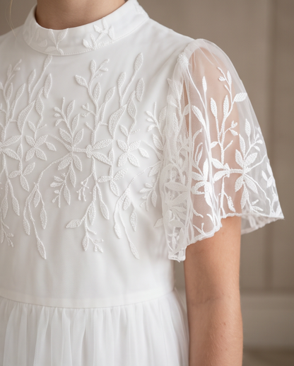 Ivory Blossom Communion Dress - twirling