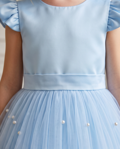 Close up of powder blue satin bodice and pearl tulle skirt detail