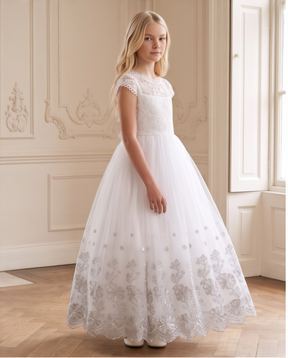 Girl wearing a lace communion dress