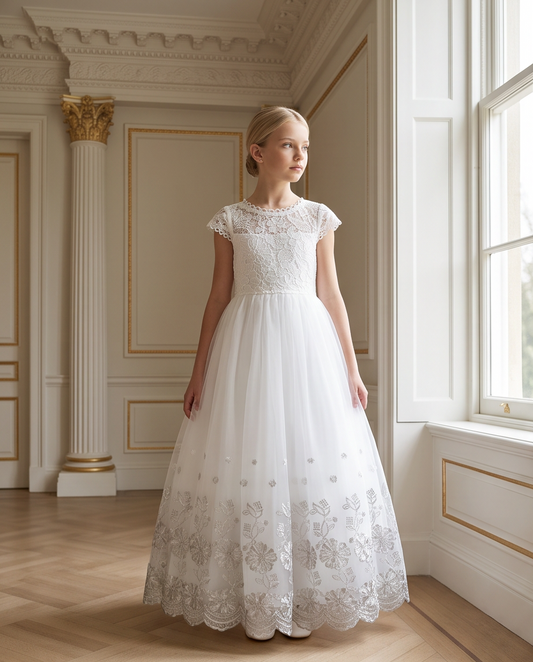 Girl wearing a lace communion dress