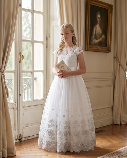 Girl wearing a lace communion dress