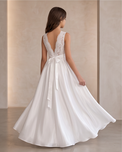 Girls white lace back dress full length back view flowing