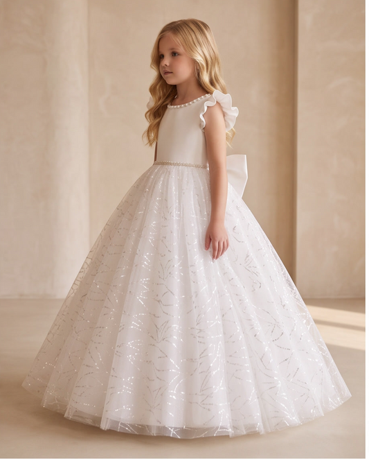 Close-up back detail of pearl-edged V-back and large satin bow on white communion dress