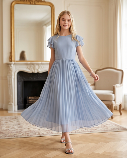 Girl wearing a light blue pleated dress with flutter sleeves