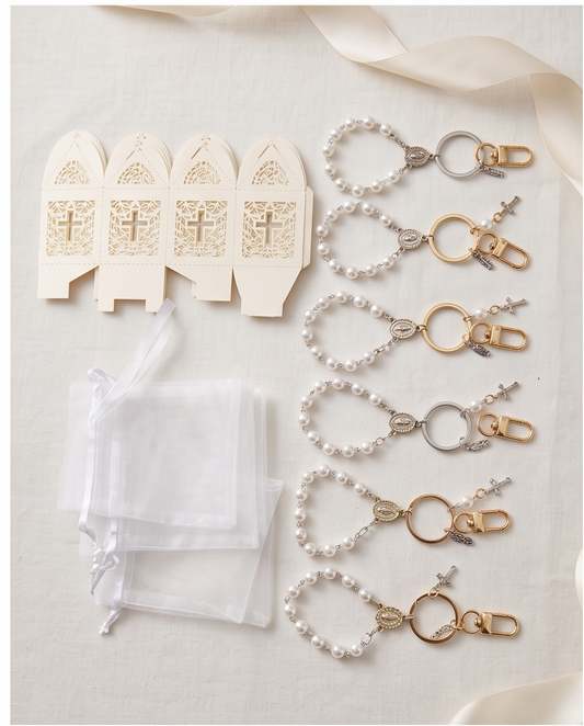 Pearl rosary key ring presented inside a white laser-cut gift box
