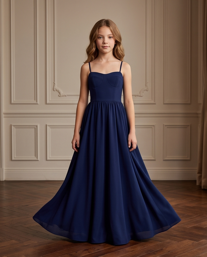 Navy blue girls formal dress shown in a formal interior