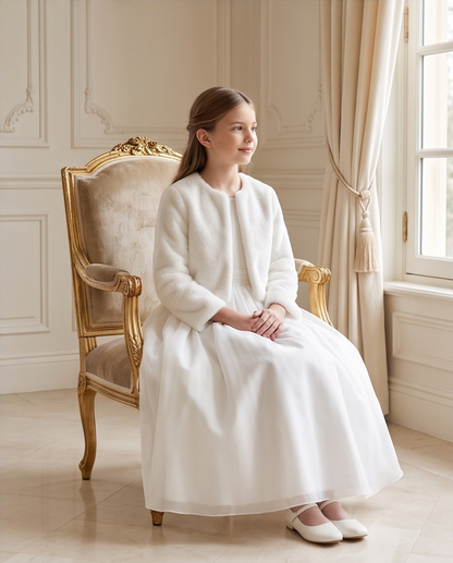 Back view of white girls communion dress and jacket