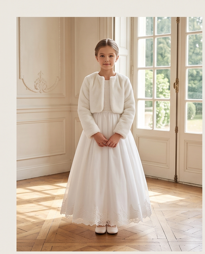 Close-up view of white communion dress bodice with jacket