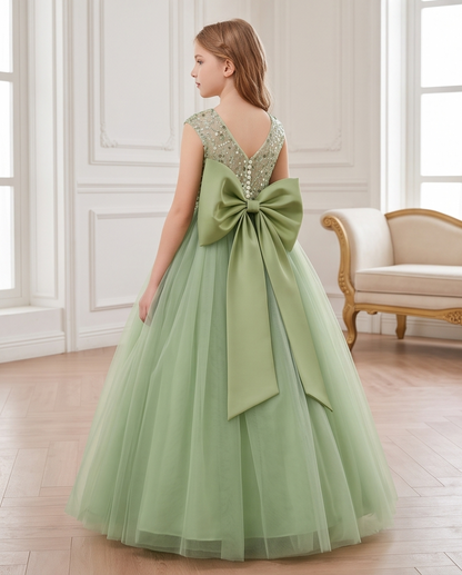 Front view of sage green sequin flower girl dress with layered tulle skirt
