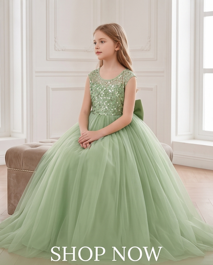 Back view of sage green sequin flower girl dress with large satin bow