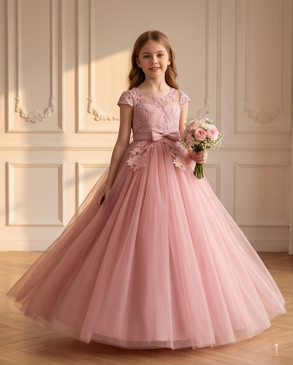 Back detail of blush pink flower girl dress with lace appliqué