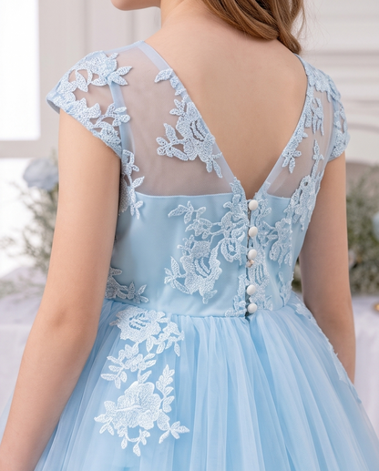 Front view of light blue lace flower girl dress with waist bow