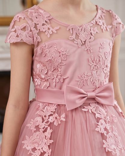 Rear view of blush pink full-length flower girl dress