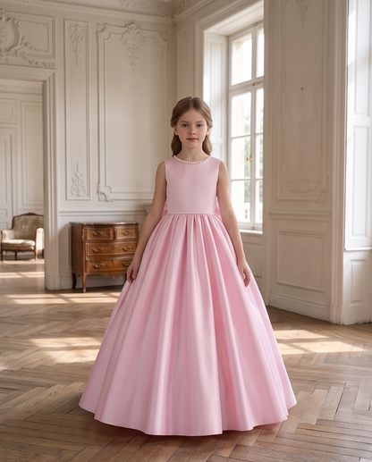 Close-up of pearl trim on blush pink flower girl dress
