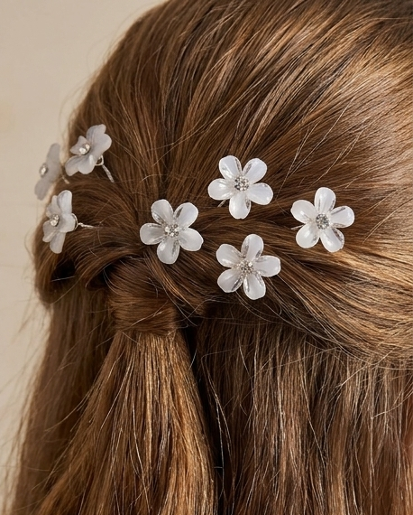 Close-up of white floral hair pin