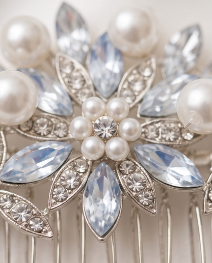 Close-up of the floral centre of pearl and crystal hair comb