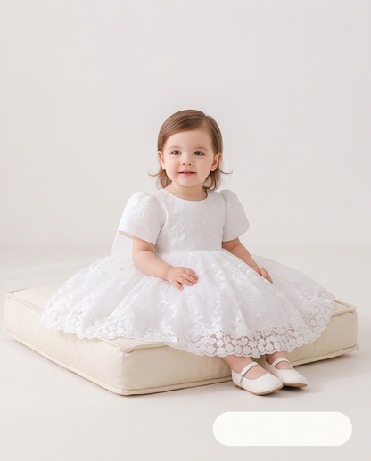 Seated view showing scalloped floral lace skirt hem