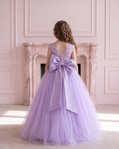 Lavender Dreams dress back showing sequin detailing, buttons and a large lavender bow.