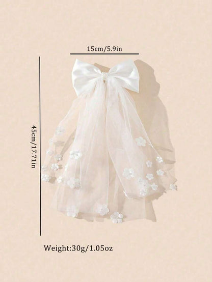 White satin bow communion veil with 3D floral appliqués showing dimensions 15cm wide x 45cm long