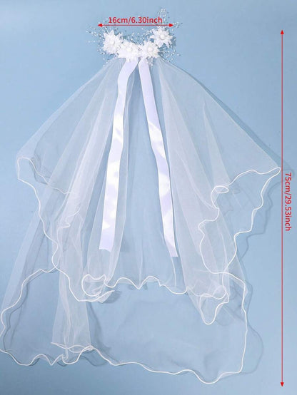 White floral comb communion veil with pearl sprays and satin ribbon trails, flat lay with measurements 16cm x 75cm