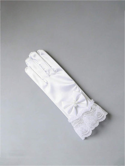 White glove with lace detailing on a gray background