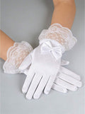 White gloves with lace cuffs and a bow on a gray background