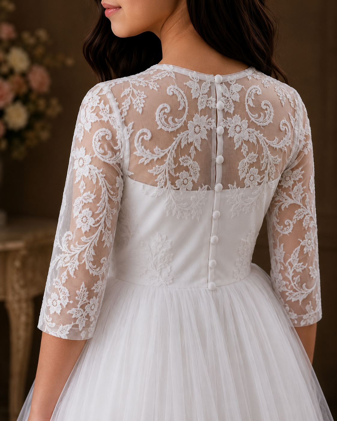 White lace wedding dress with a blurred floral background