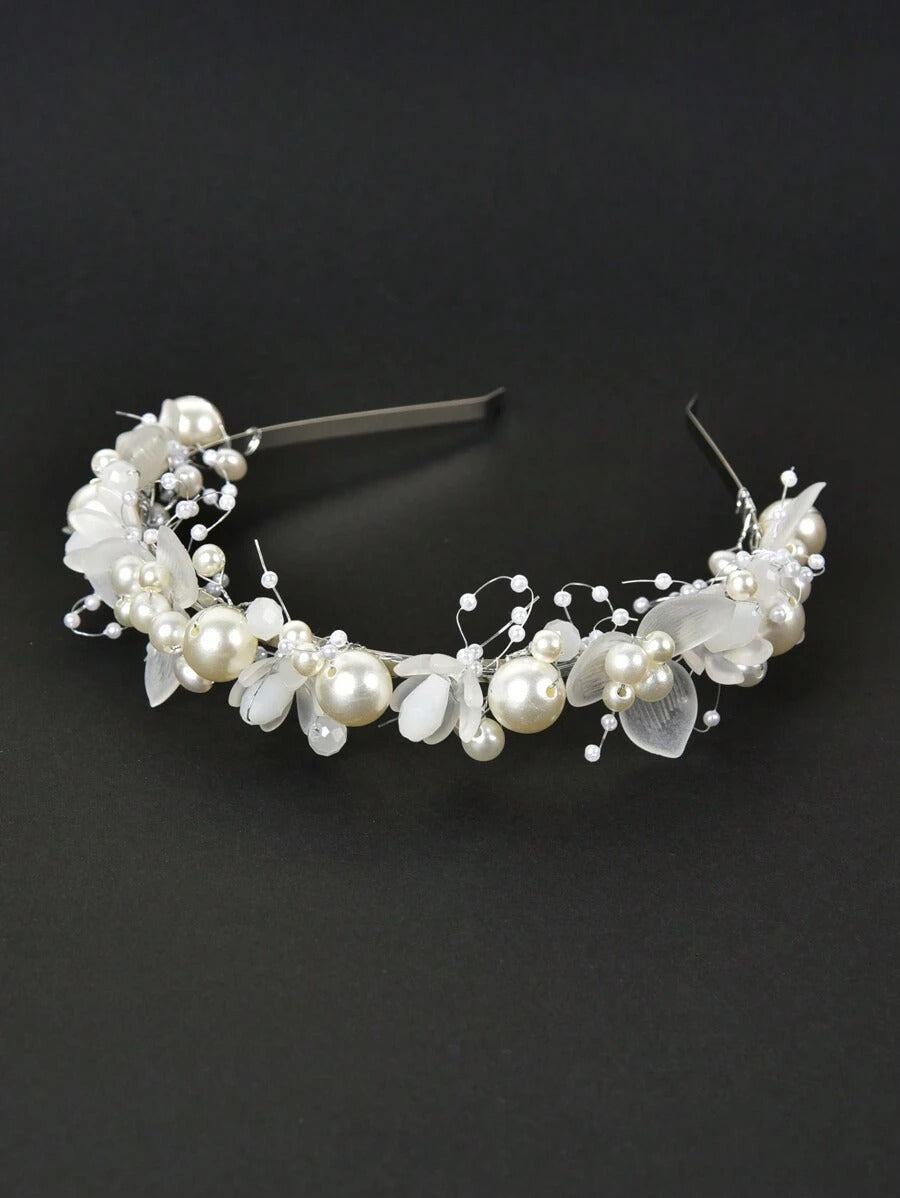 Pearl and leaf headband on a black background