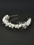 Pearl and leaf headband on a black background