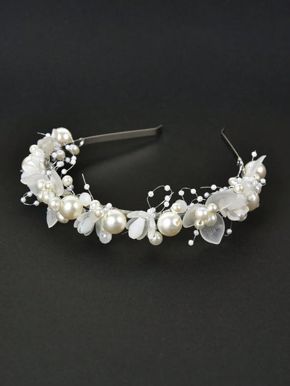 Pearl and leaf headband on a black background