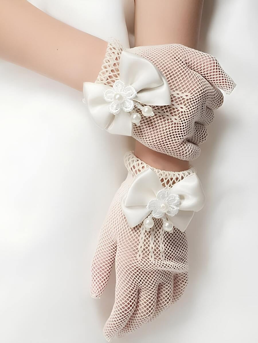 young girl hand wearing a mesh glove