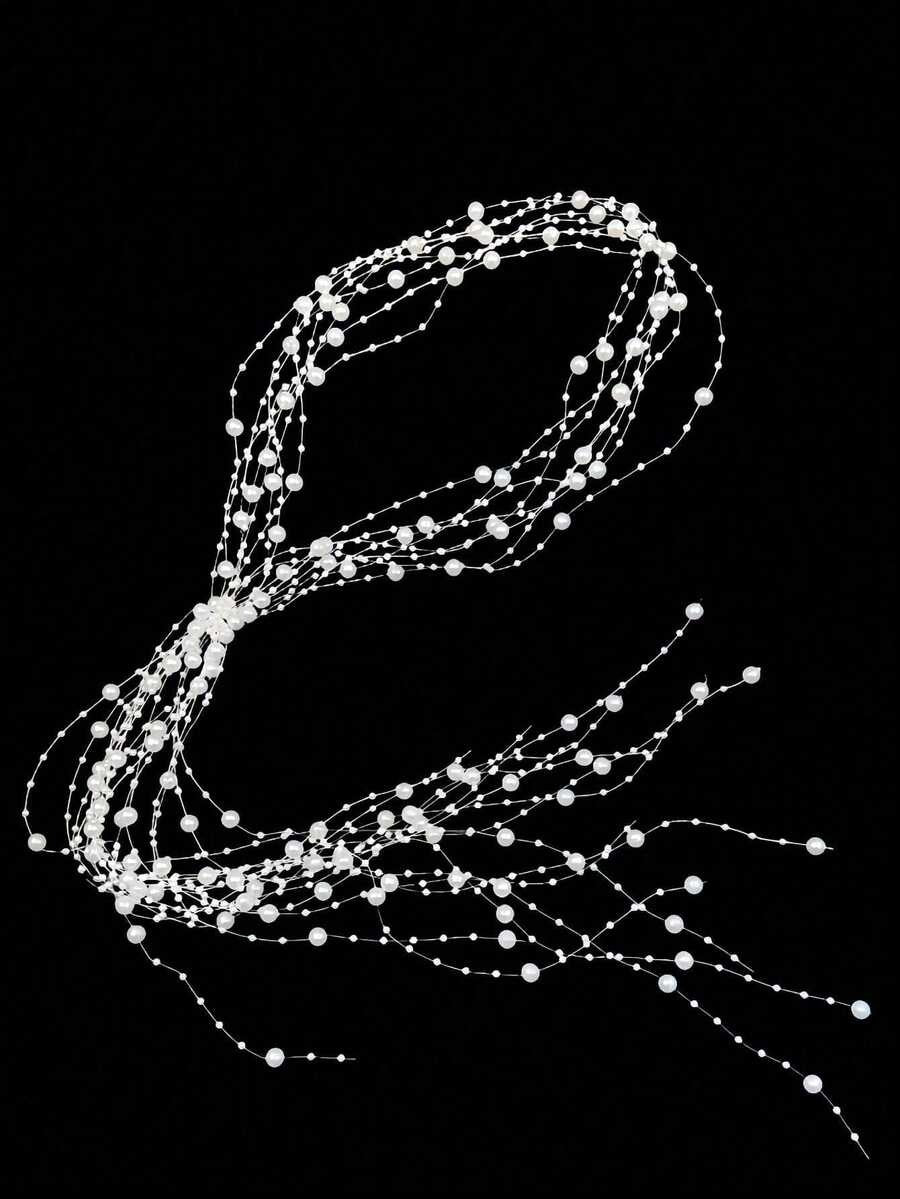 Decorative string of lights shaped like a '2' on a black background