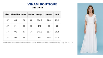 Girl wearing a short sleeve chiffon white dress with a size chart