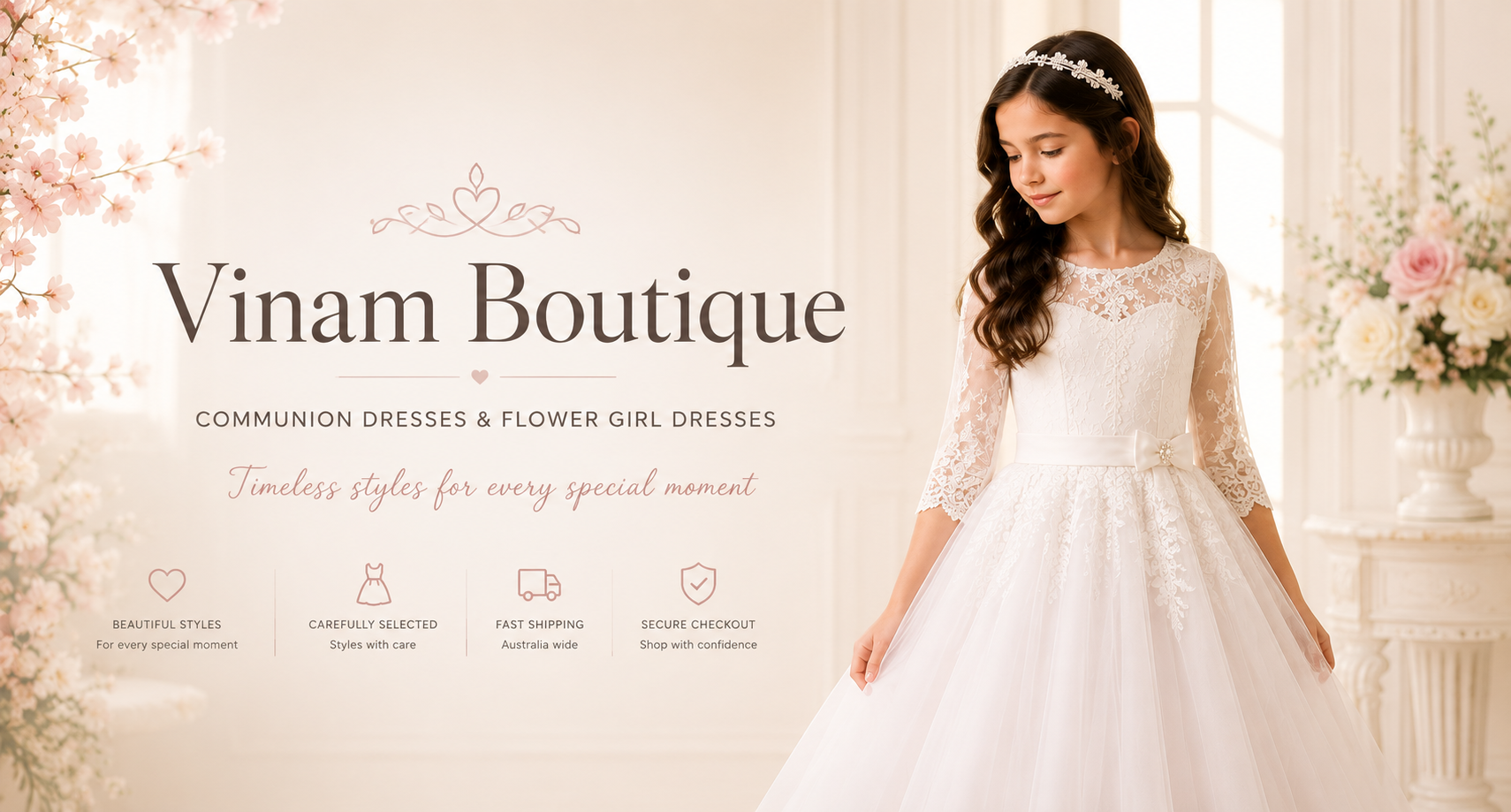Young girl in a white communion dress with 'Vinam Boutique' branding.