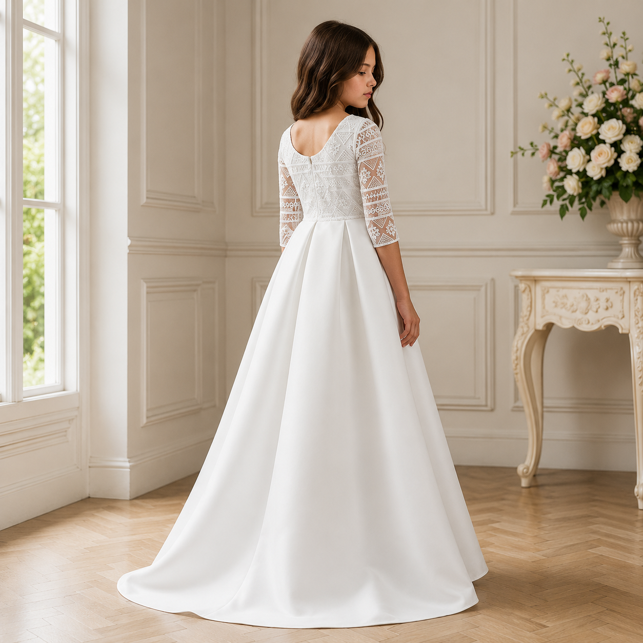 girl wearing a white bridal satin dress with back turned