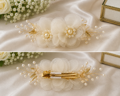 Decorative hair accessory with flowers and pearls on a soft fabric background