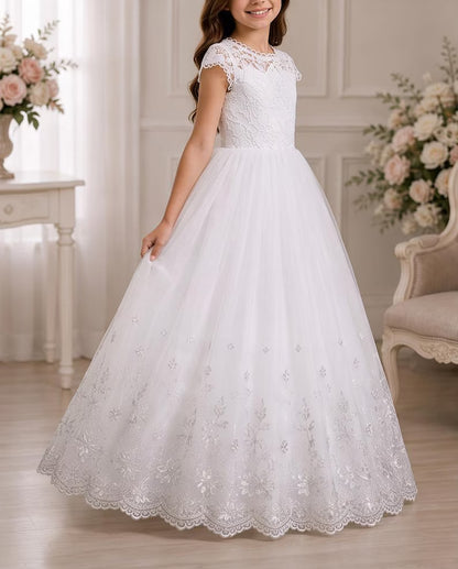 Child wearing a white communion dress