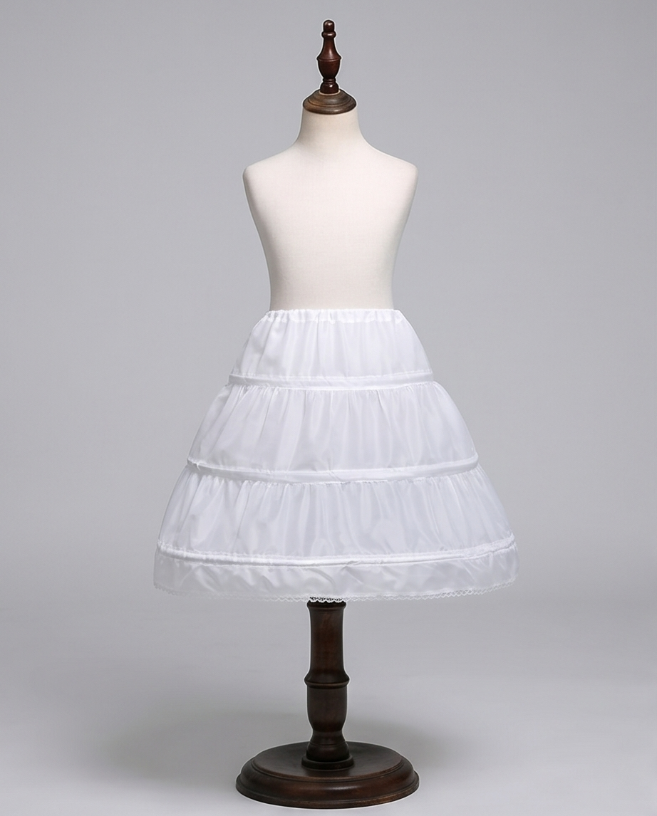 White petticoat on a mannequin against a gray background