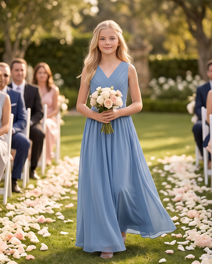 Girl wearing a dusty blue bridesmaid dress 