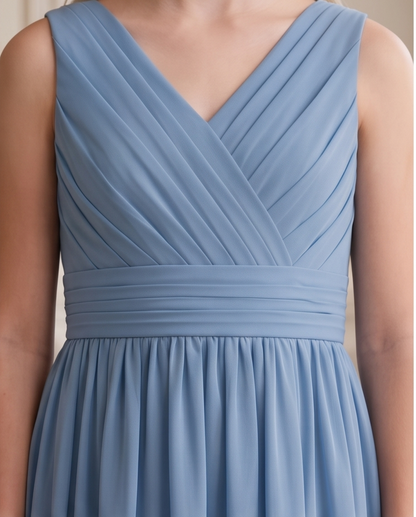 Girl wearing a dusty blue bridesmaid dress 