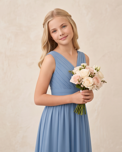 Girl wearing a dusty blue bridesmaid dress 