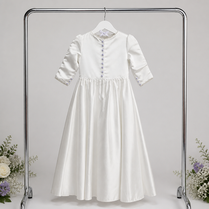 White dress on a hanger with a gray background