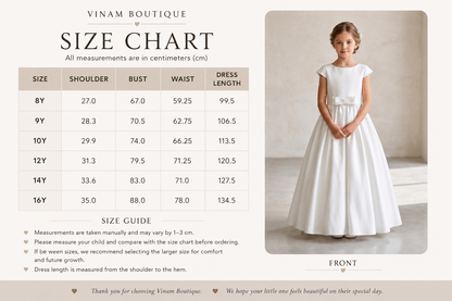 Vinam Boutique size chart for children's dresses with a model wearing a white dress.